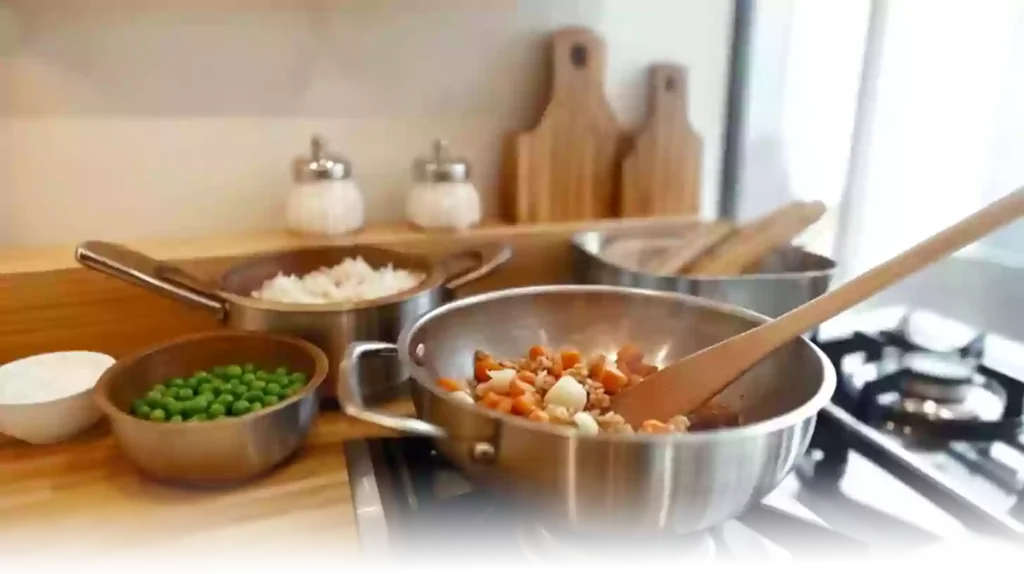 Cooking Gochujang Fried Rice in a wok, with sautéed vegetables and aromatic garlic in a modern kitchen setting.